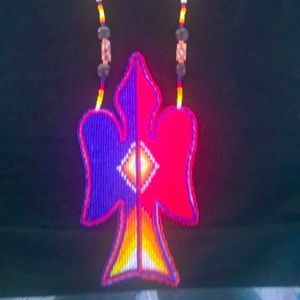 Handmade beadwork Native American fertility bird medallion